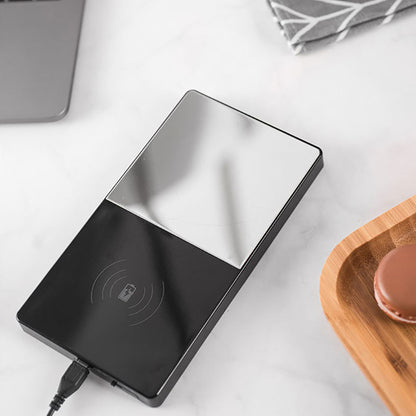 2-in-1 mug warmer with wireless charger for coffee & devices.